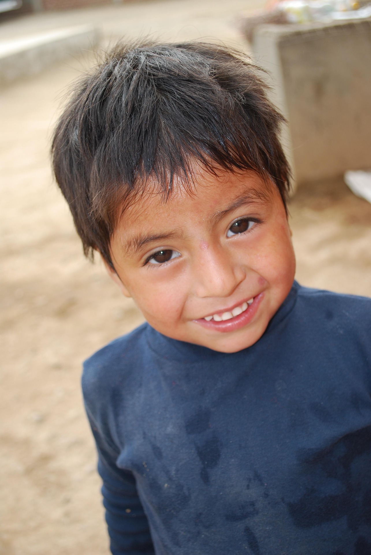 Child smiling — education and health