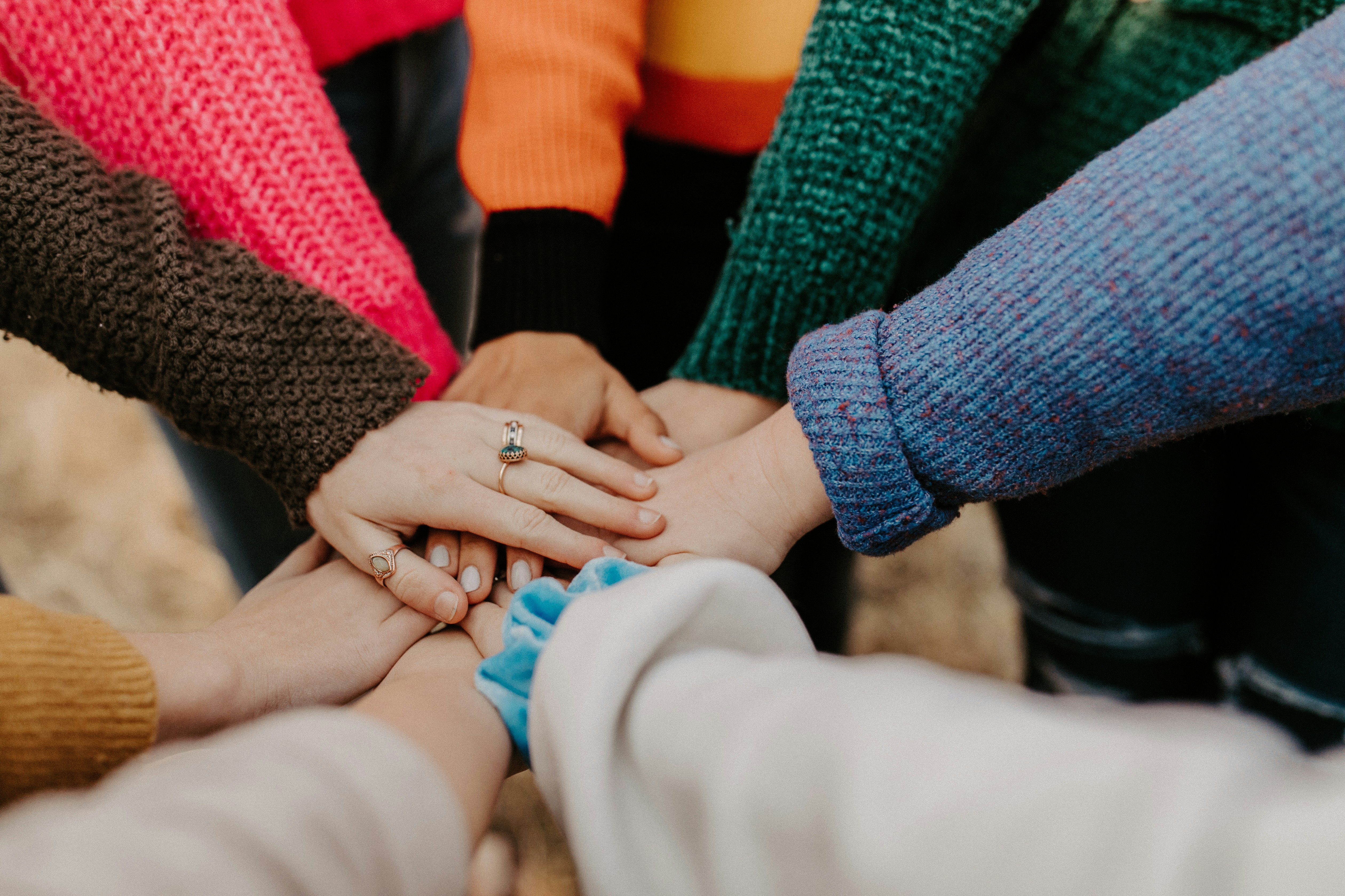 Hands joined in community unity